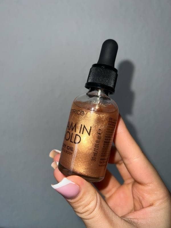 Масло для лица и тела с шиммером Catrice Glam In Gold 30 мл 3